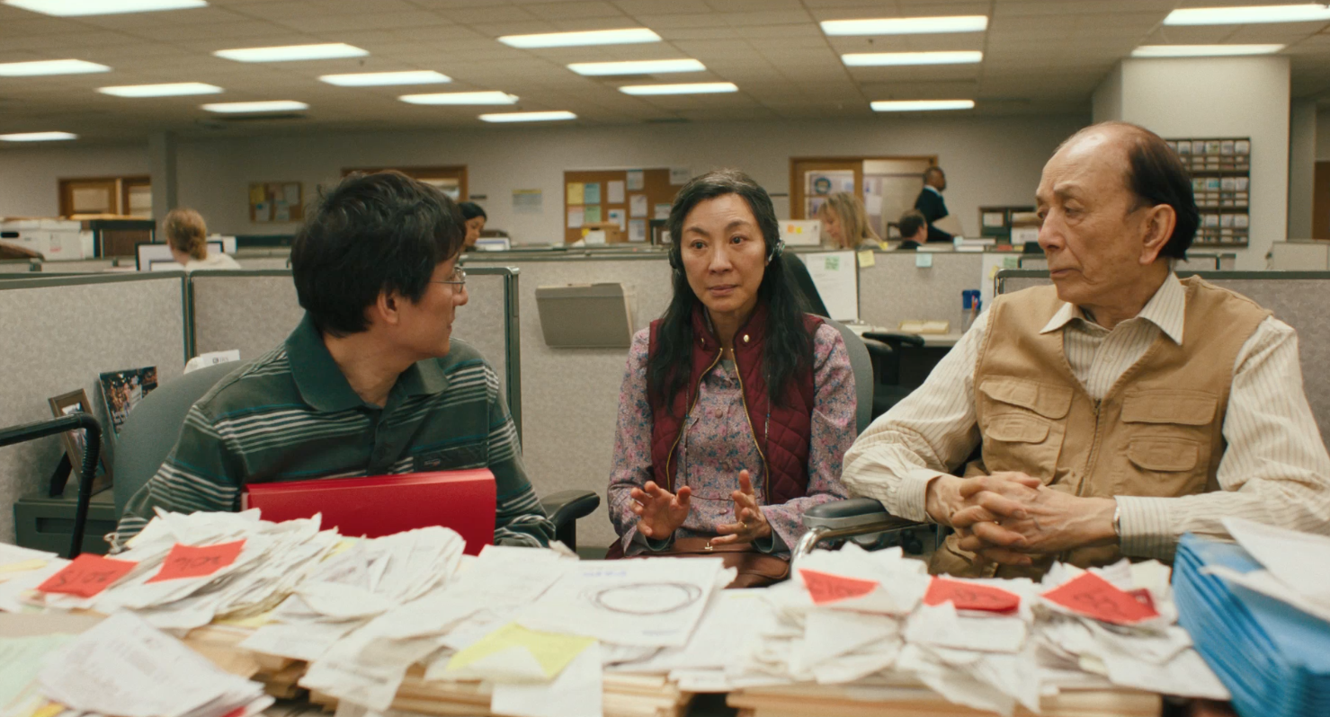 Evelyn, Waymond, and Gong Gong at the IRS office