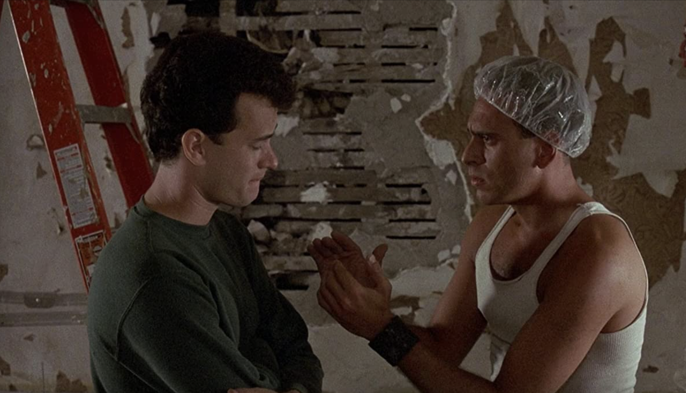 Tom Hanks in the money pit winces at his breaking home