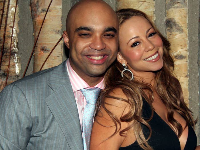 Mariah and her nephew pose at an event