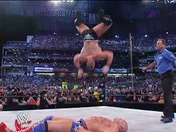 Brock Lesnar nearly lands on his head after botching a Shooting Star Press.