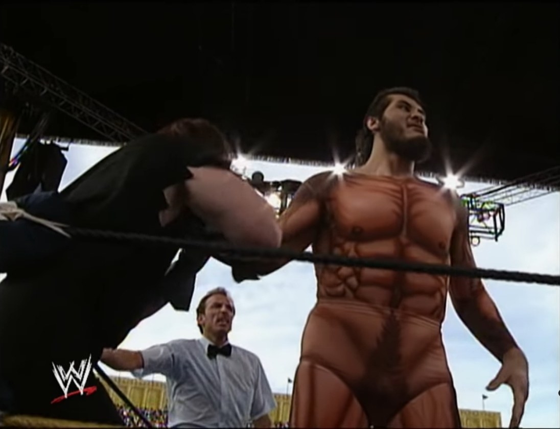 Giant Gonzalez chokes The Undertaker at Wrestlemania 9