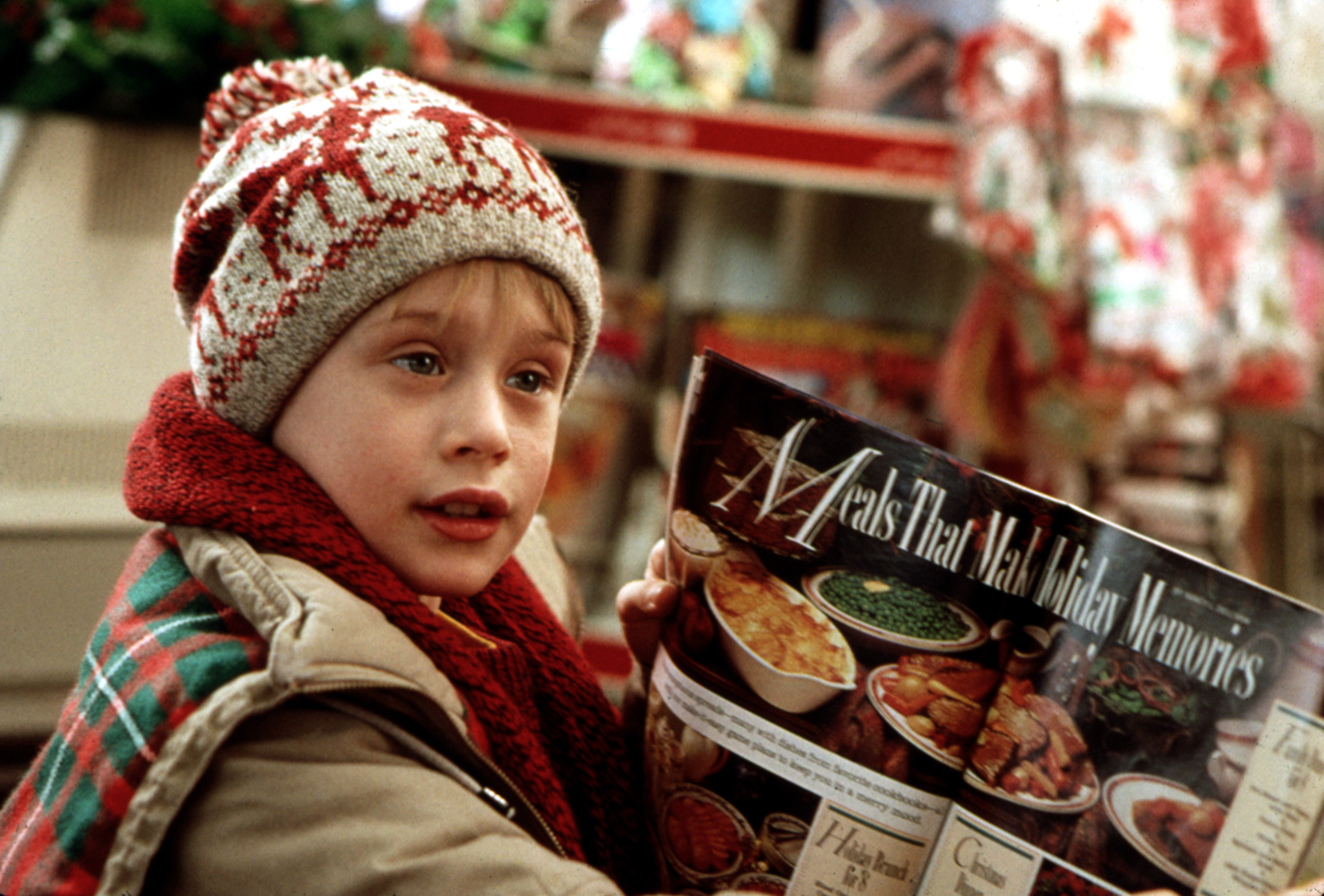 Macaulay Culkin reads a food magazine