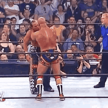 Shawn Michaels superkicks Kurt Angle at Wrestlemania 21