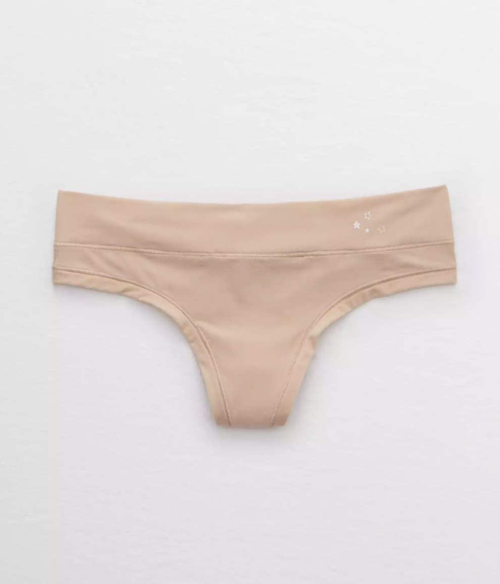 The beige thong with little silver stars in top right hand corner of waistband
