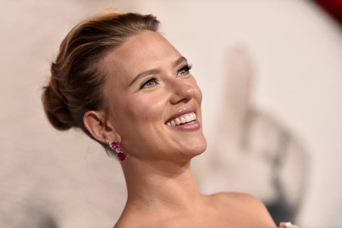 Scarlett Johansson smiling on the red carpet