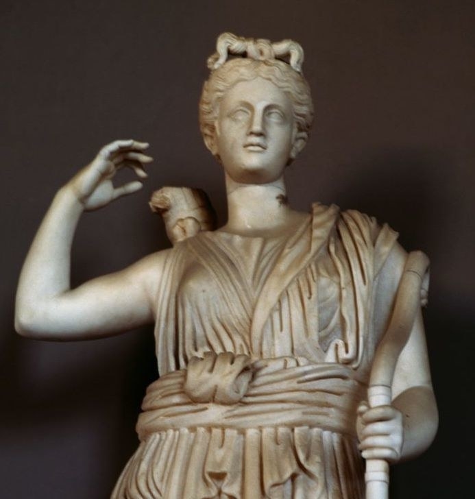 A statue of Artemis about to draw an arrow.