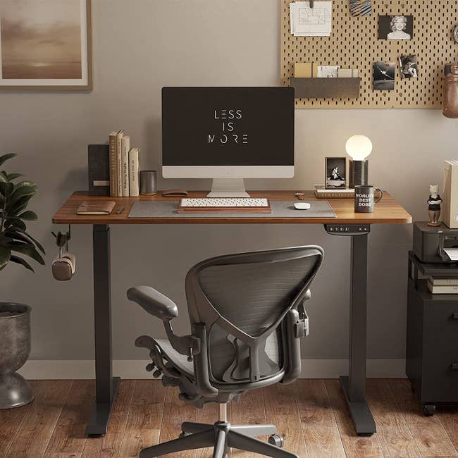 an at-home office set-up with the walnut standing desk
