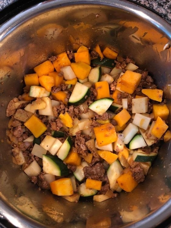 reviewer photo of the instant pot making chorizo sausage, butternut squash and zucchini