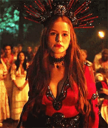 Cheryl in a red outfit ready to sacrifice Archie