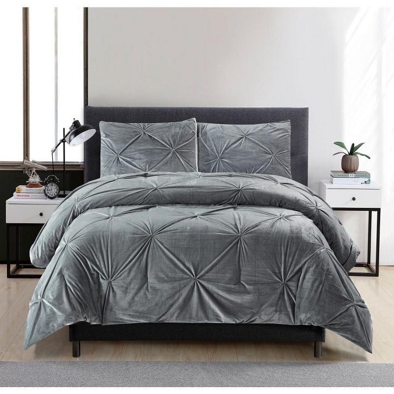 gray velvet comforter and sham pillows with hand-tufted design