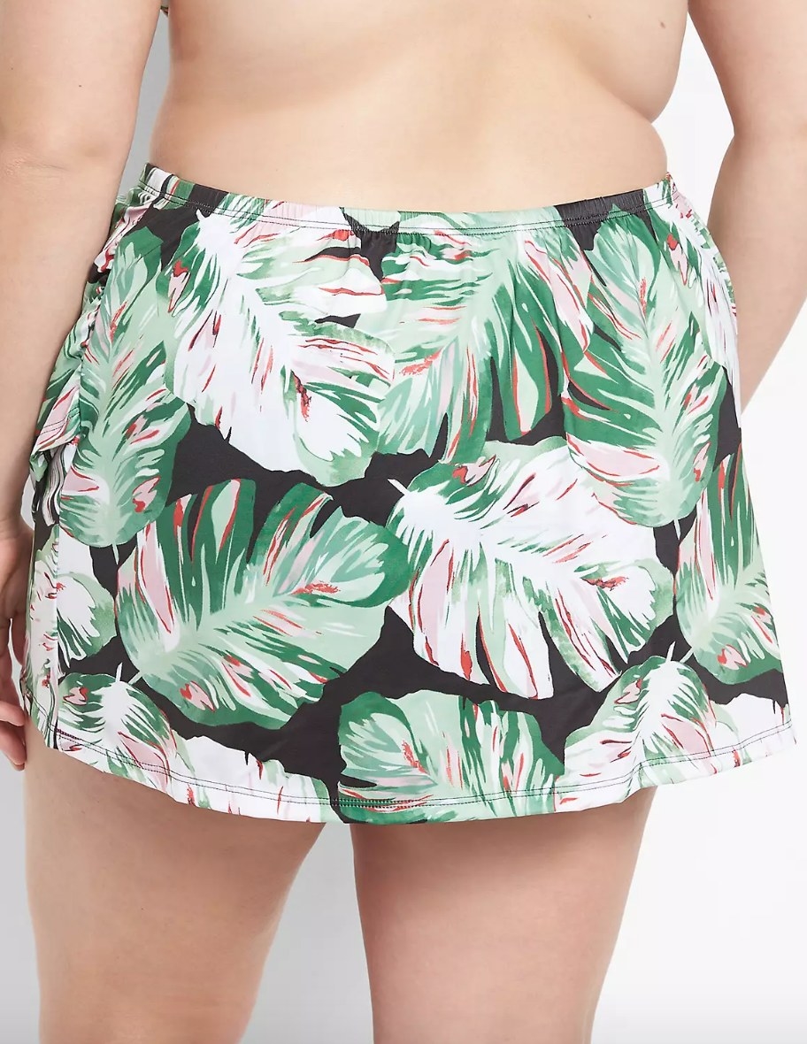 Close up of palm leaf patterned swim skirt