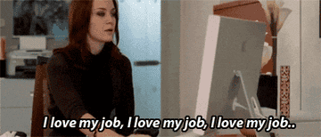 Emily Blunt in &quot;Devil Wears Prada&quot; staring at her computer screen while repeating &quot;I love my job, I love my job...&quot;