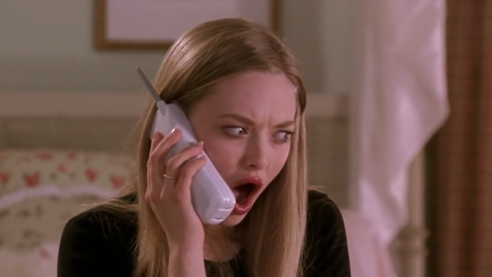 Karen looking shocked and offended on the phone in mean girls