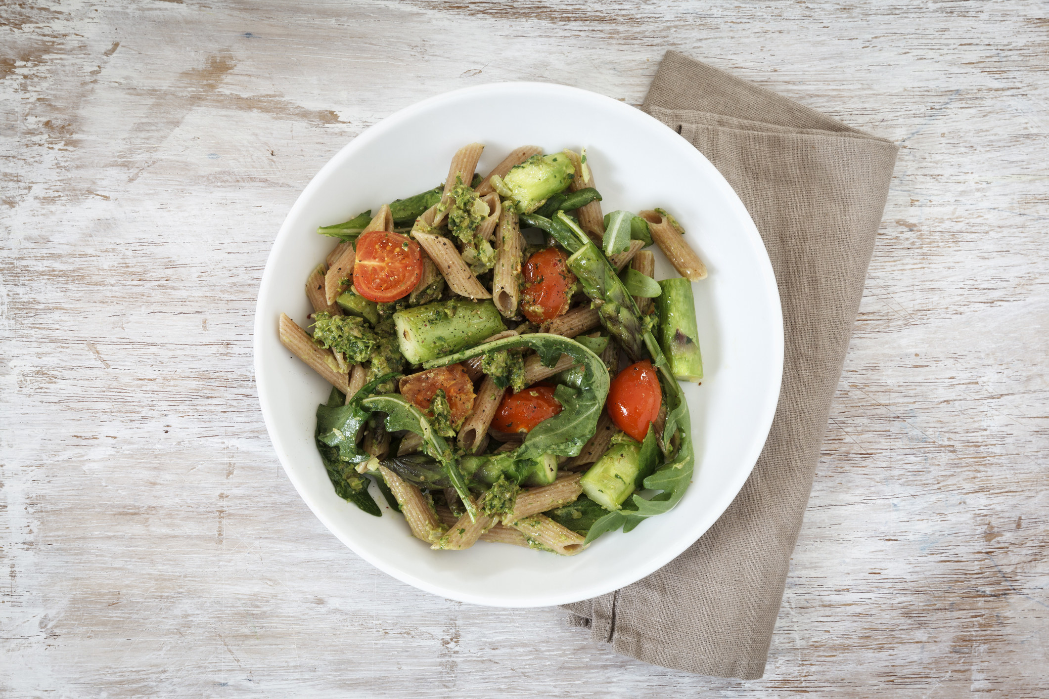 Pasta with lots of vegetables in a bowl