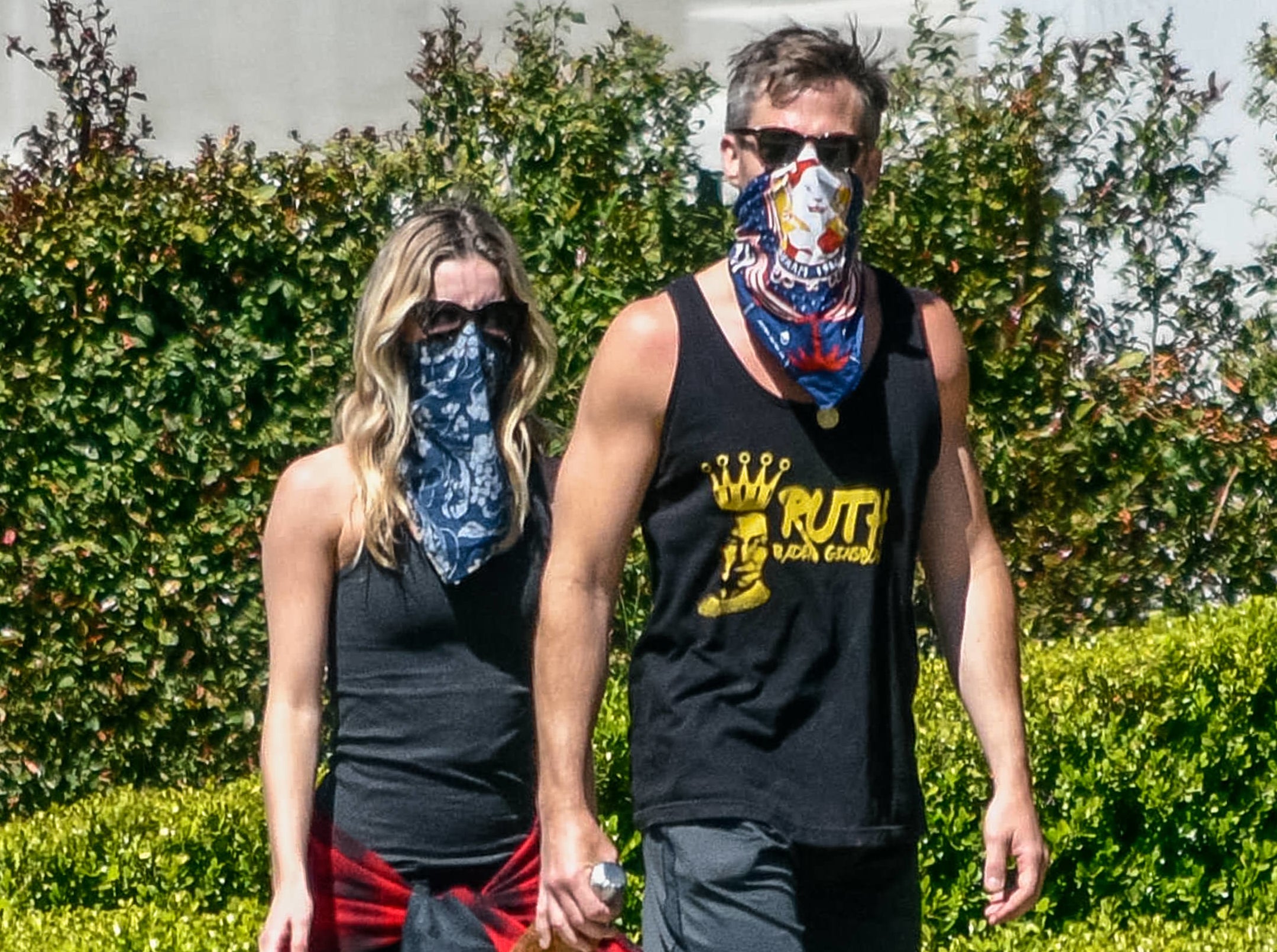 Chris and Annabelle wear bandanas while out on a walk