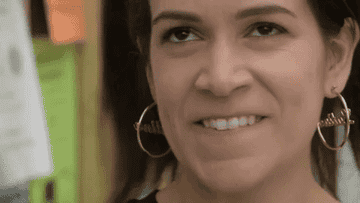 Abbi Jacobson from Broad City doing a funny smile with her teeth showing