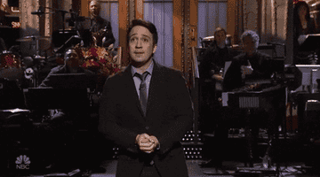 Lin-Manuel Miranda smiles as he hosts &quot;Saturday Night Live&quot; and receives applause from the audience