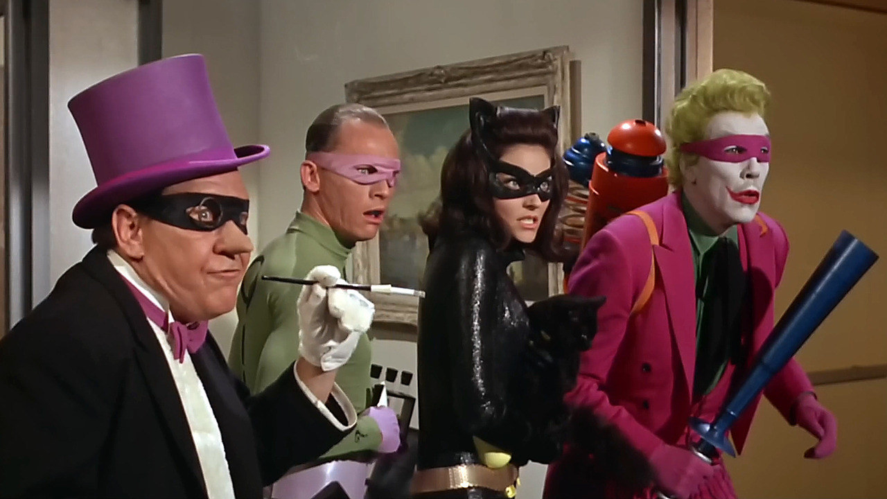 Burgess Meredith as The Peguin, Rank Gorshin as The Riddler, Lee Meriwether as Catwoman and Cesar Romero as The Joker stand ready for action