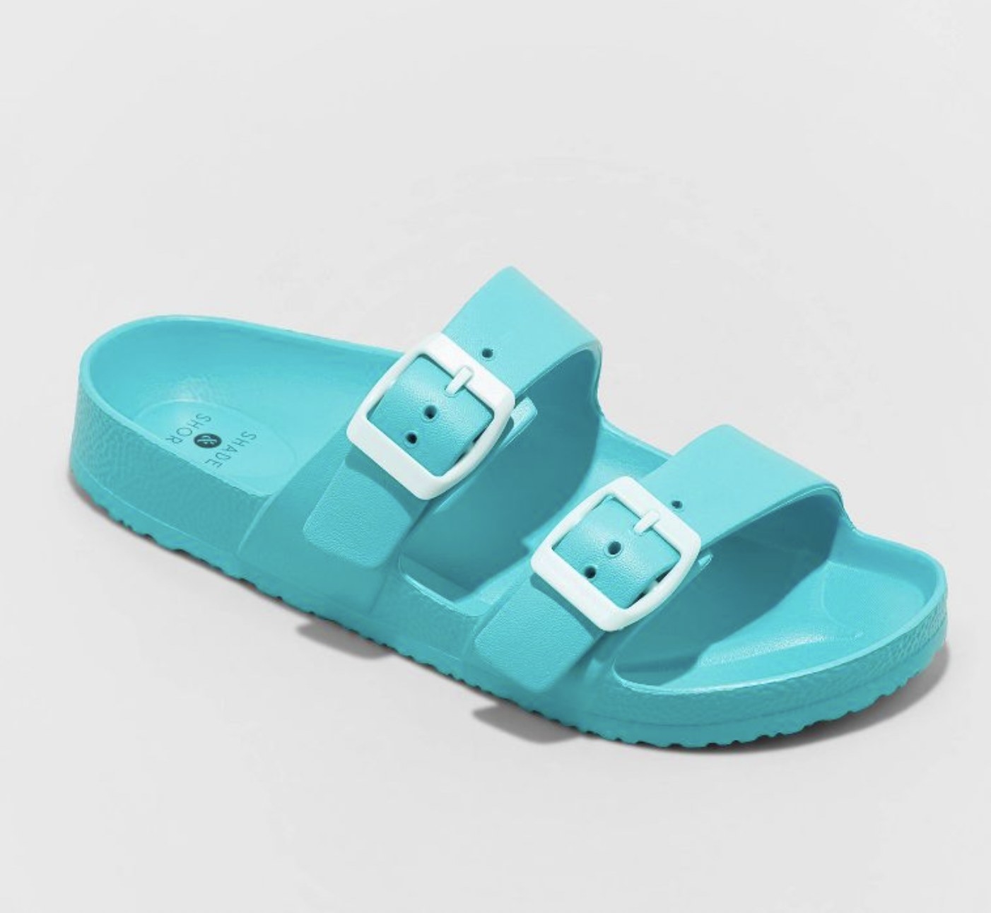 the sandals in teal blue