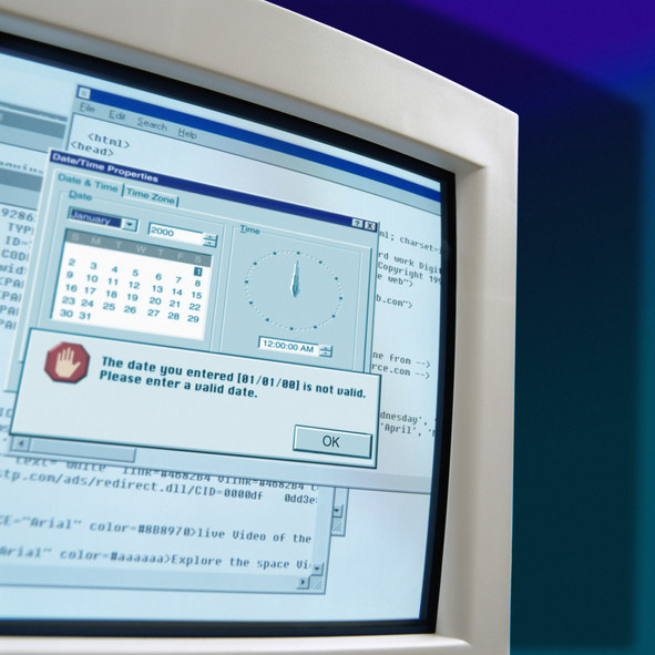 An old computer with the message &quot;The date you entered [01/01/00] is not valid&quot;