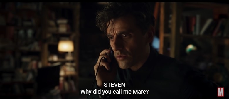 Steven on the phone, looking bewildered, with a subtitle reading, &quot;Why did you call me Marc?&quot;