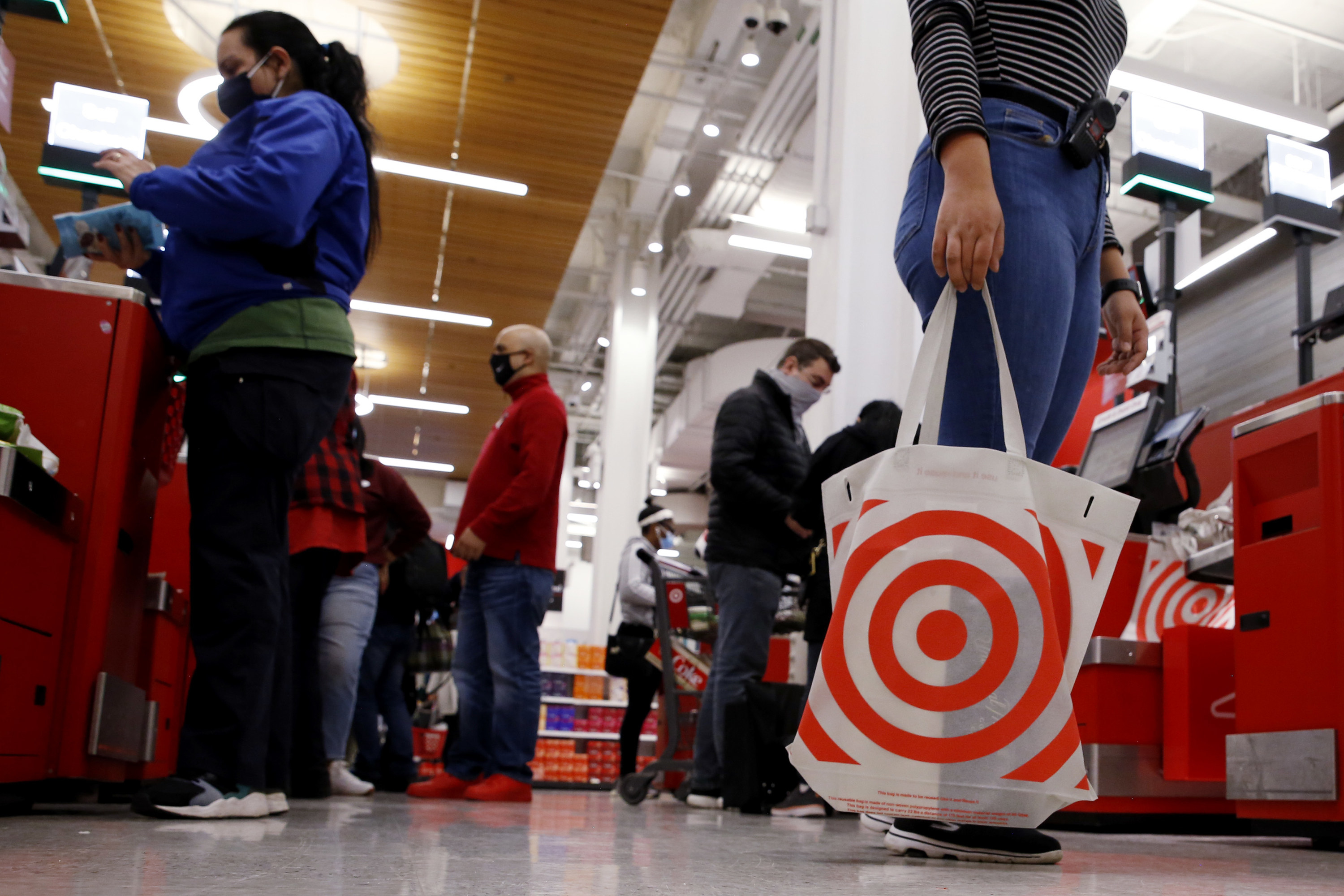 Customers shopping at a Target store