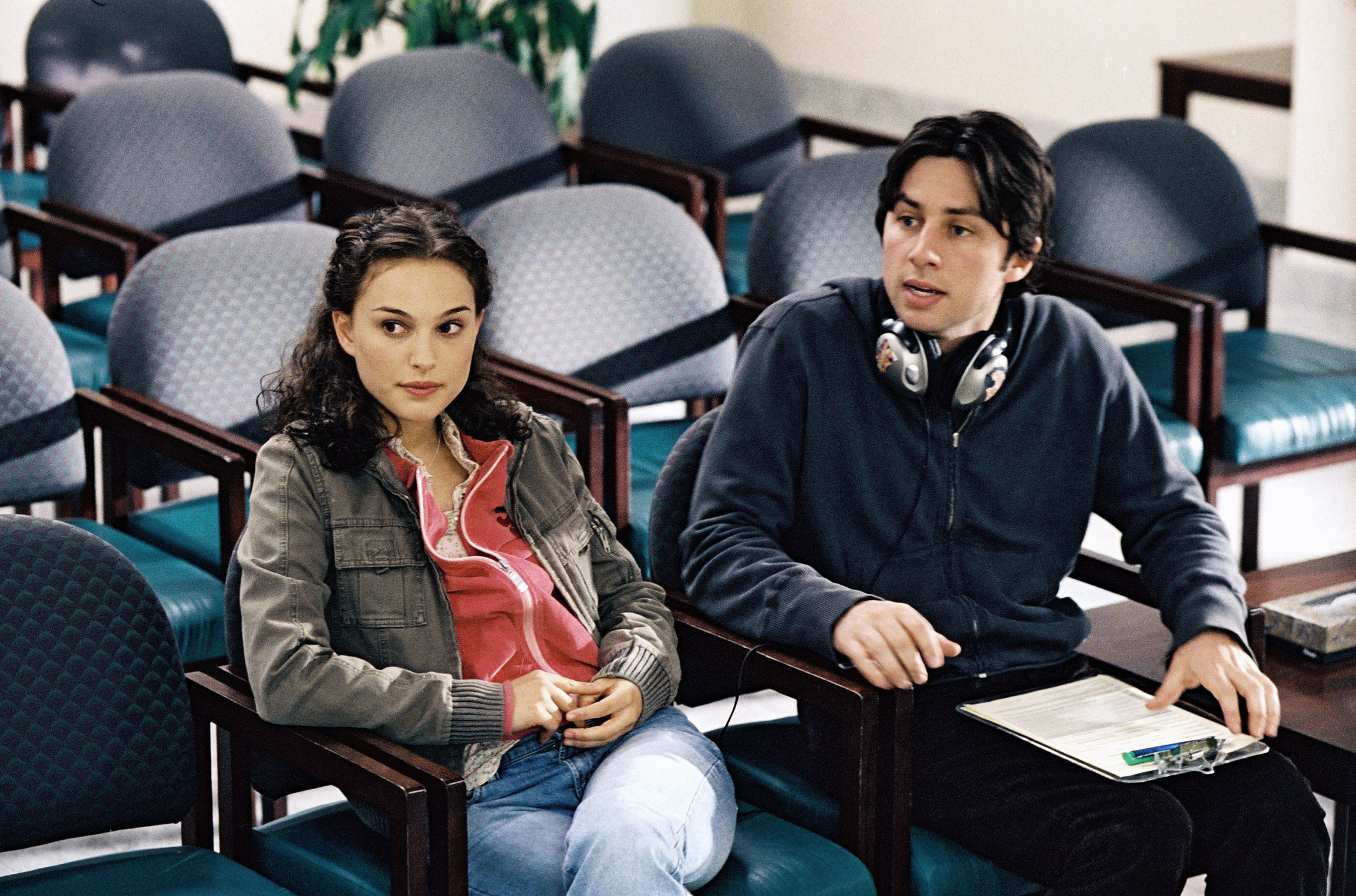 Andrew and Sam sitting in the center of a vacant seating area