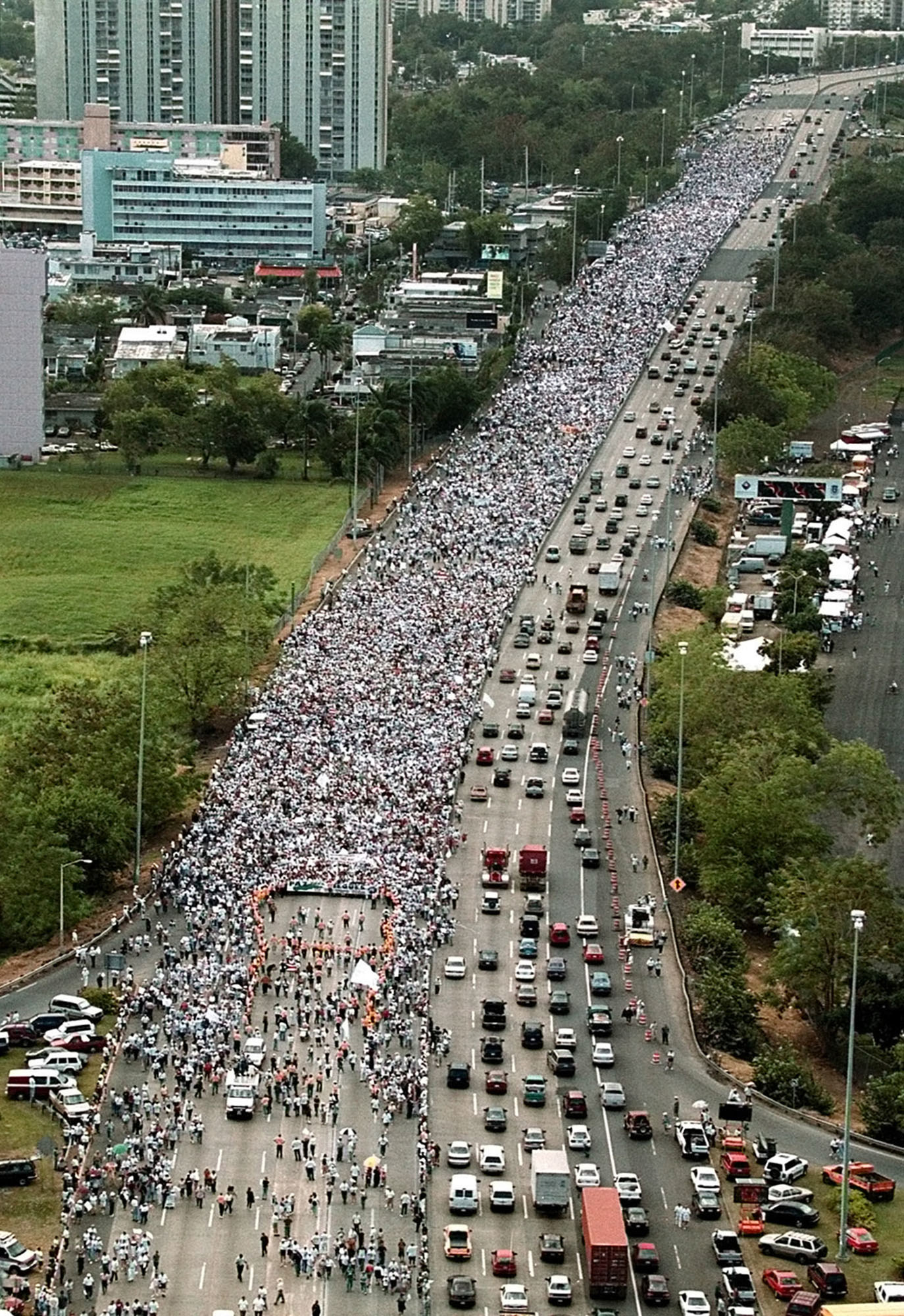 Thousands of citizens march in protest against President Clinton&#x27;s decision to resume military training activities on the island of Vieques Puerto Rico