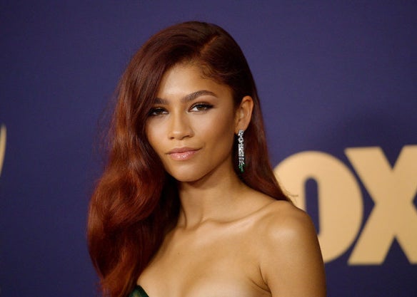 Zendaya posing on a red carpet 