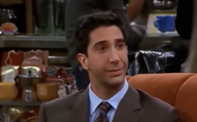 Ross talking on a couch