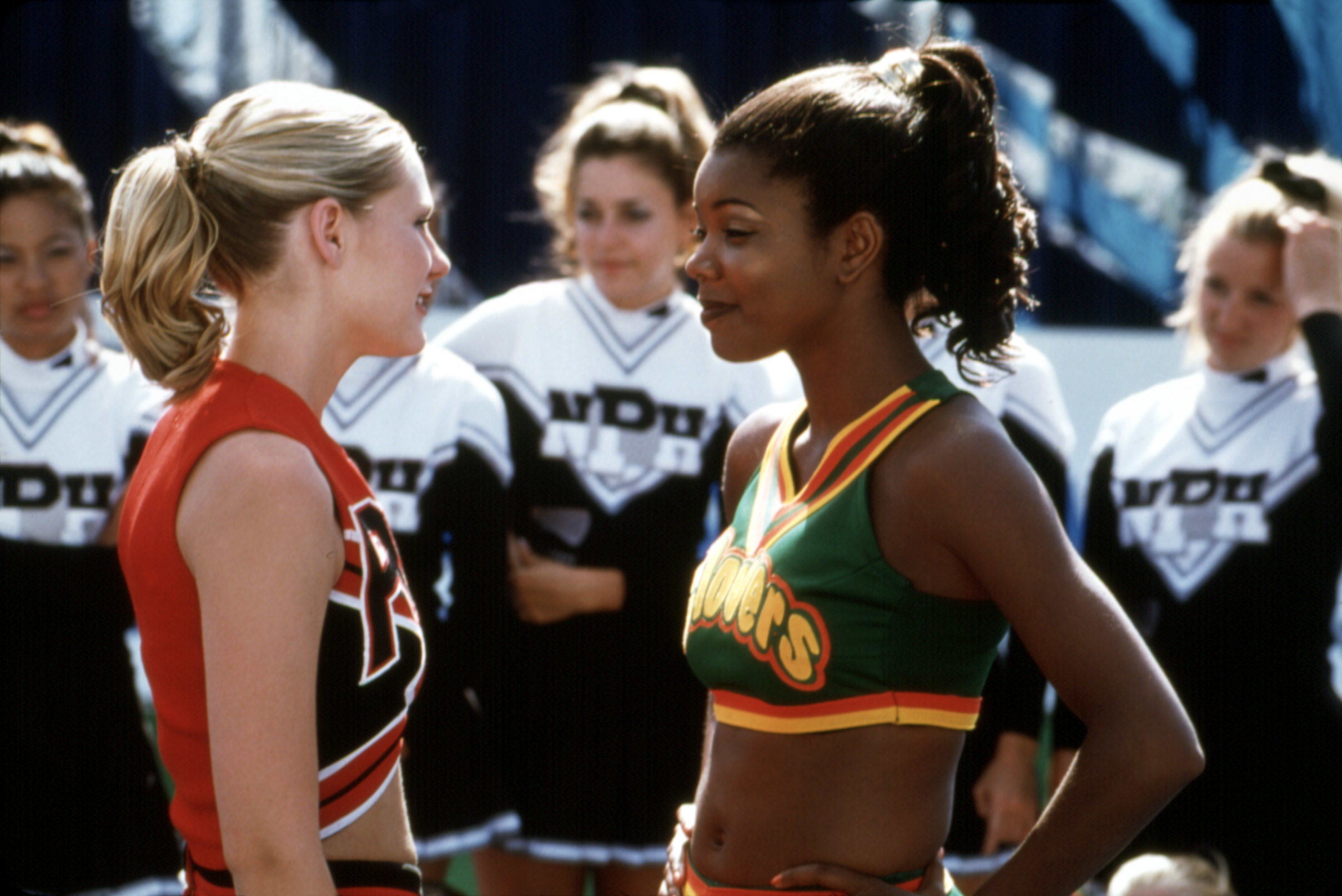 Gabrielle and Kirsten Dunst facing off as rival cheerleaders in Bring It On