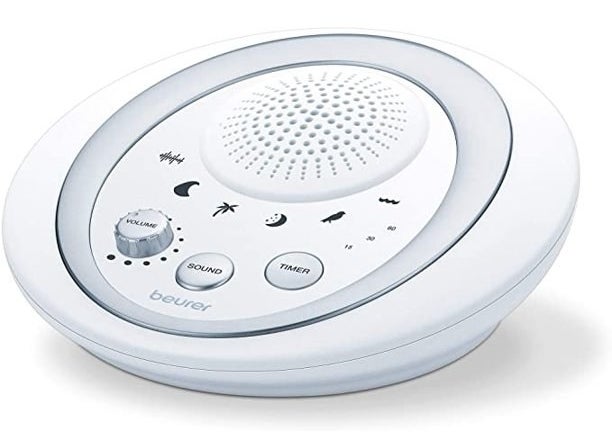 a close up of the white noise machine in white