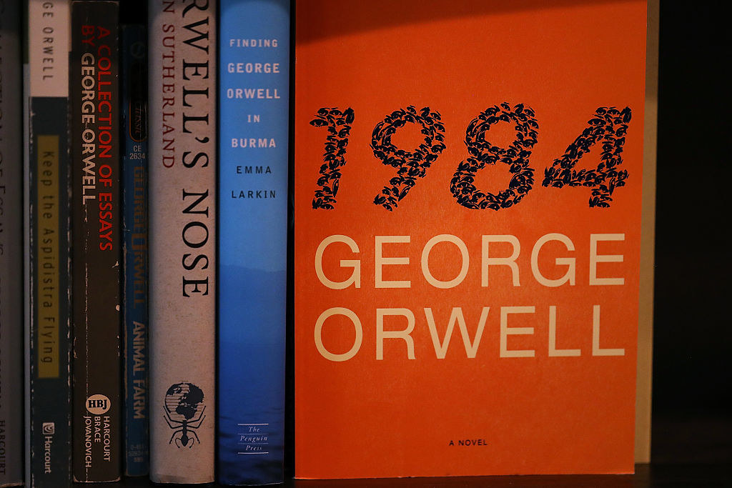 &quot;1984&quot; by George Orwell on a bookshelf.