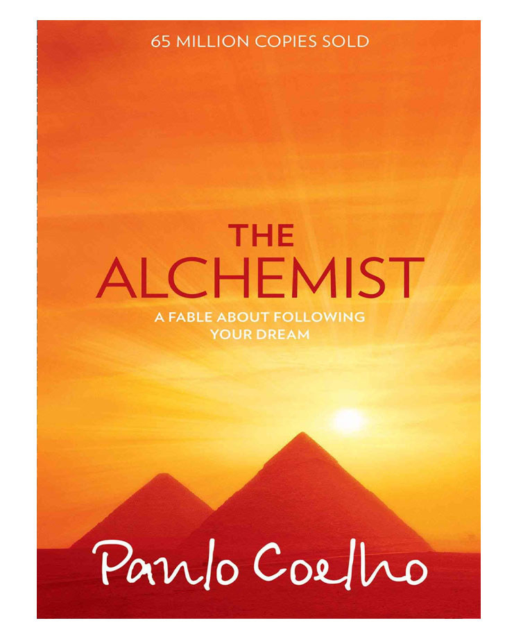 The book cover of &quot;The Alchemist&quot; by Paulo Coelho.