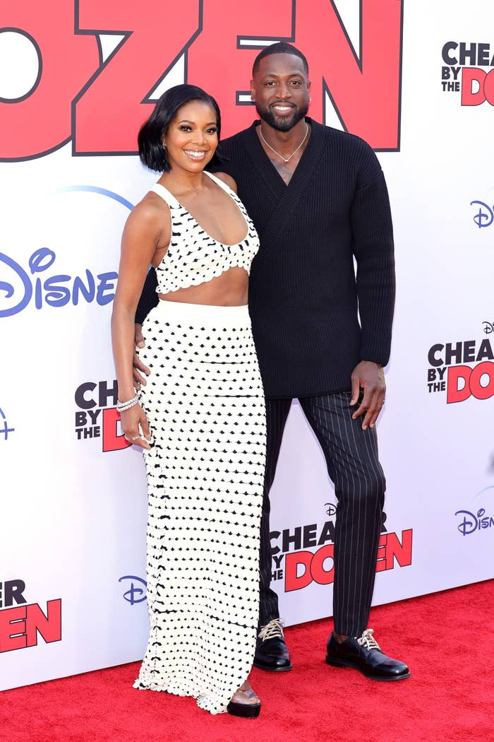 Gabrielle and Dwyane posing together at the red carpet premiere of Gabrielle&#x27;s film Cheaper By the Dozen
