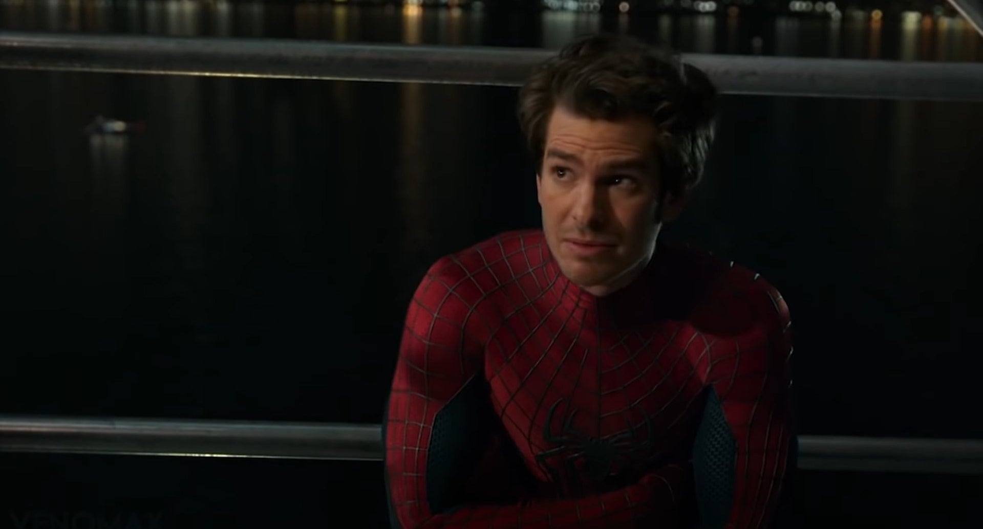 Peter-Three crouching at Liberty Island in "Spider-Man: No Way Home"