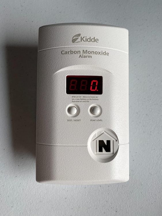 reviewer&#x27;s picture of the CO detector on their wall