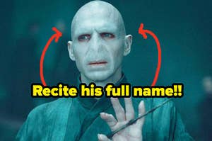 A close up of Lord Voldemort as he holds his wand