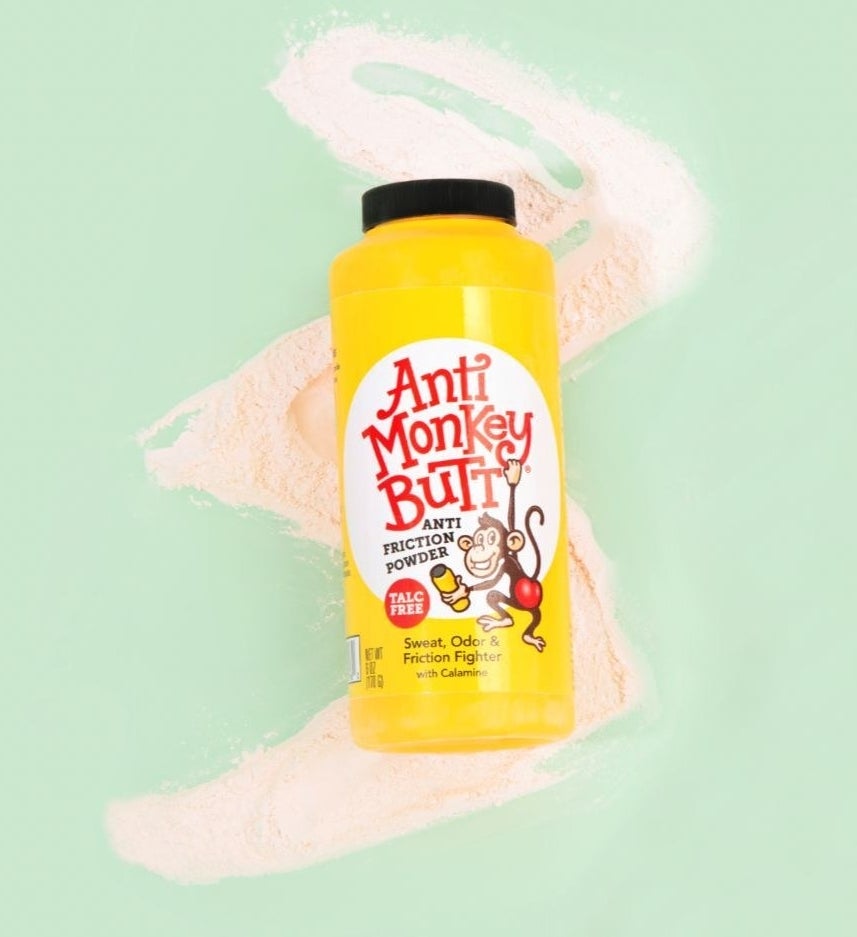 A bottle of the anti-friction powder on a colourful background