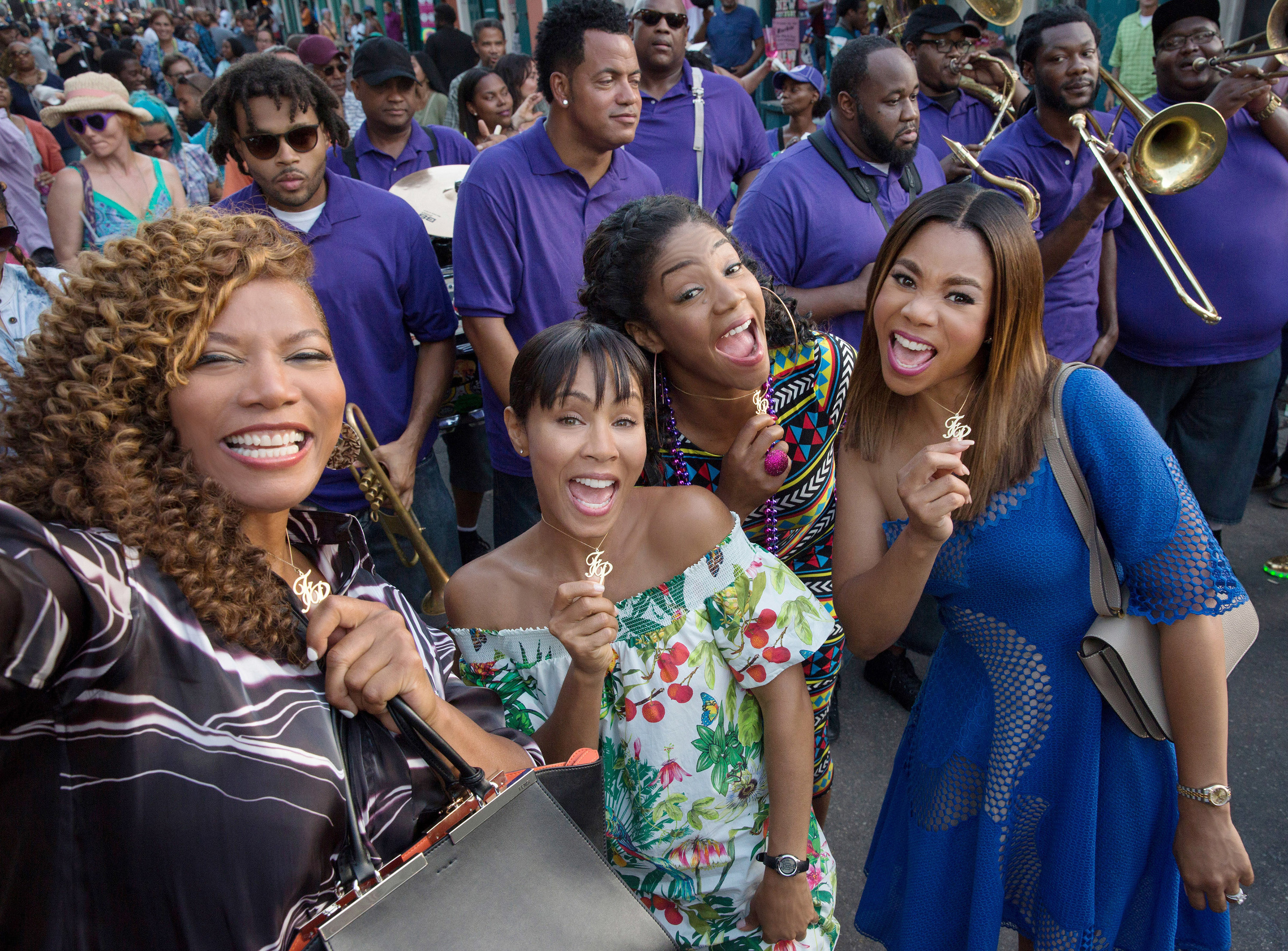 Queen Latifah, Jada Pinkett Smith, Tiffany Haddish, and Regina Hall pose with their Flossy Posse necklaces