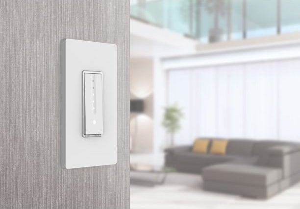 the white paddle-style switch in a decorated room