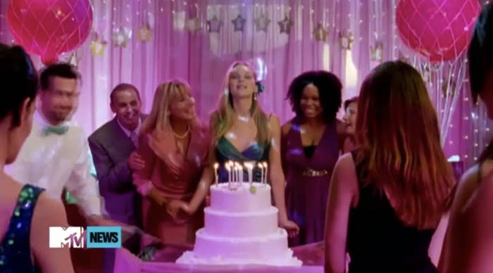 Jennifer Lawrence about the blow out the candles on the cake in the promo