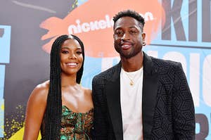 Gabrielle Union and Dwyane Wade posing together at an event