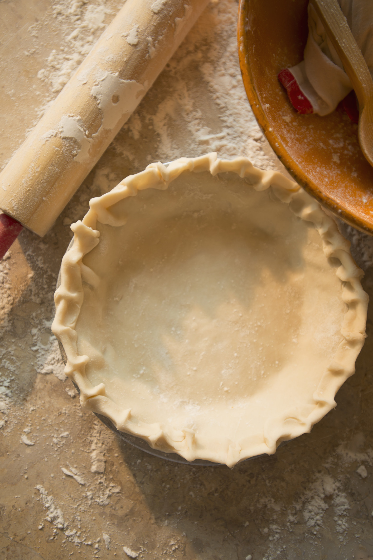 Pie crust dough in a pie pan
