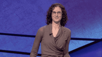 female Jeopardy contestant dancing