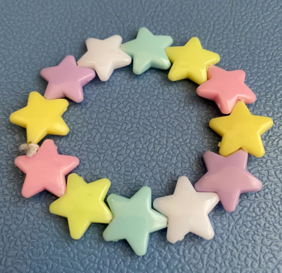Stretchy pastel-colored star bracelet