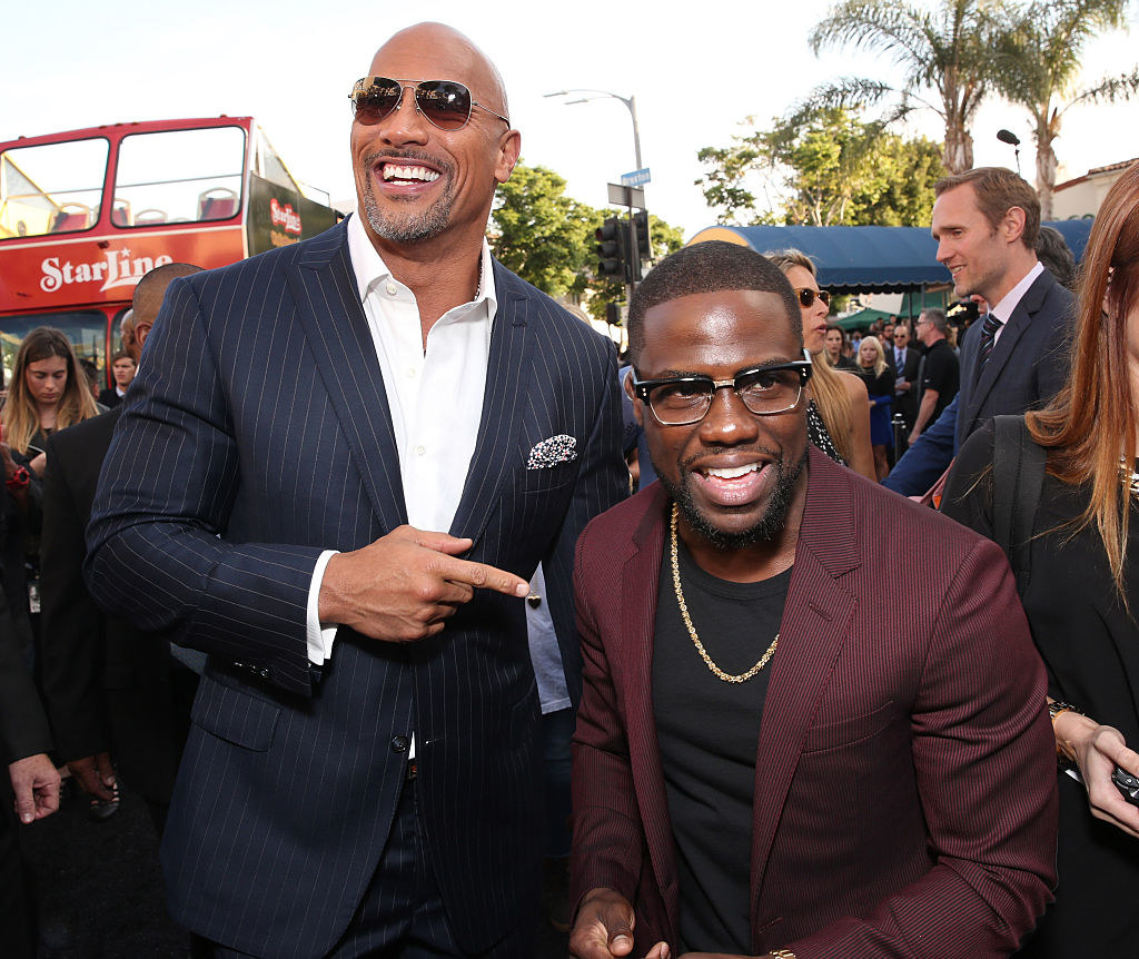 Dwayne Johnson and Kevin Hart attend a film premiere