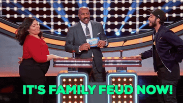 Steve Harvey talking to two contestants on &quot;Family Feud&quot;