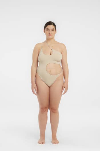 A reviewer wearing the swimsuit