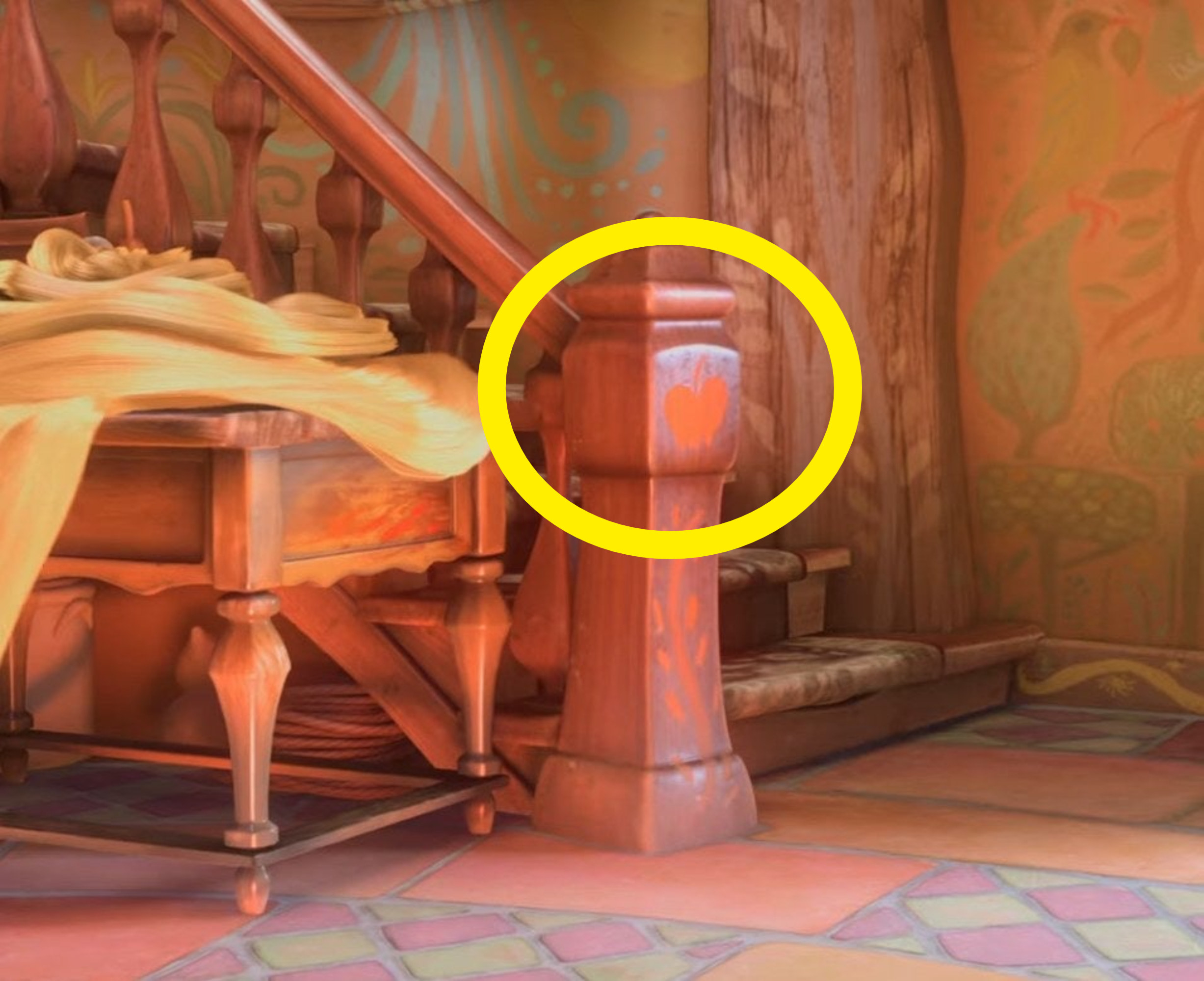 An apple painted on the staircase in Tangled, representing Snow White